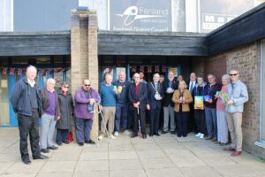 People stnading in front of Whittlesey food bank doors